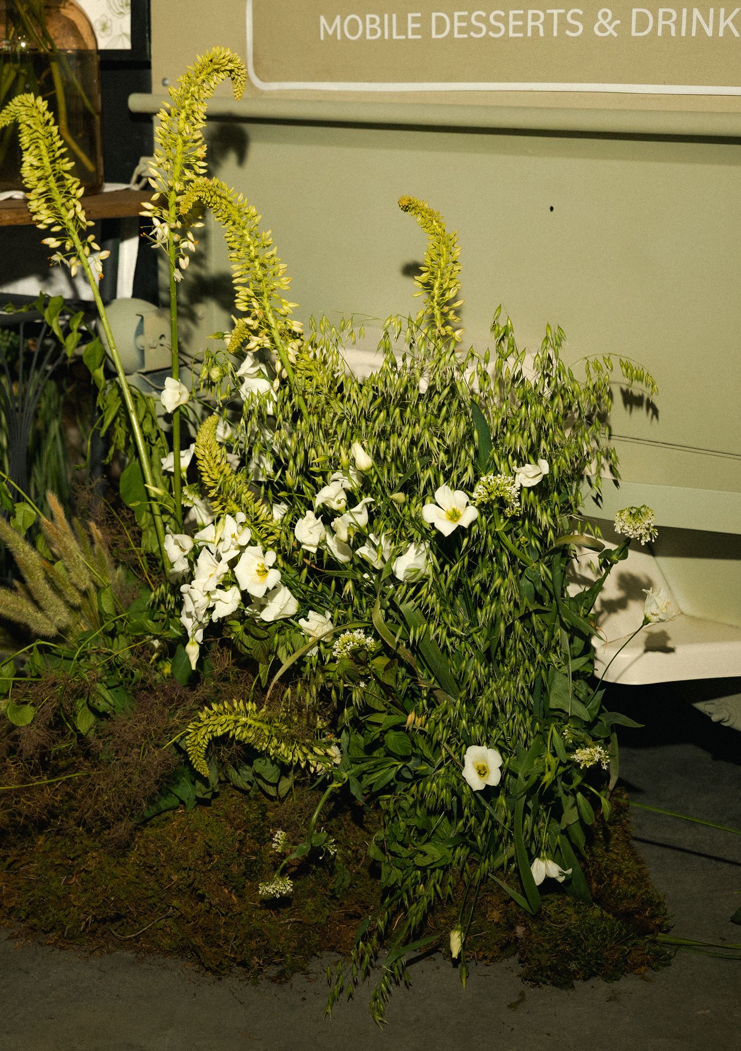 Arrangement of oat grass and white florals